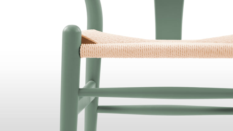 MASTERFULLY MADE | The beauty is truly in the details when it comes to this timeless design. Each chair is made with a focus on design heritage and quality, as evidenced by the intricate seat, which is woven by hand by our artisans.
