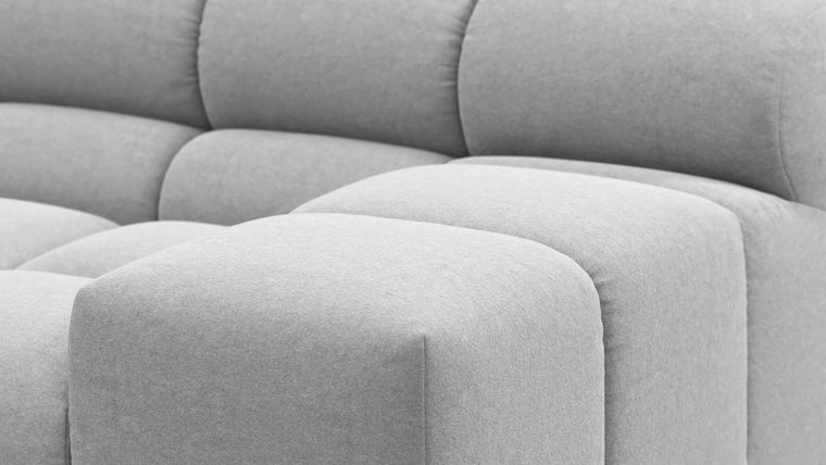 SUPERIOR COMFORT | Designed with the easy-going, informal ethos of the 1970s in mind, the Tufted modules are generously proportioned, coming together in a bench-like base with barely-there connections, allowing plenty of room for you to lean back and curl up in comfort.
