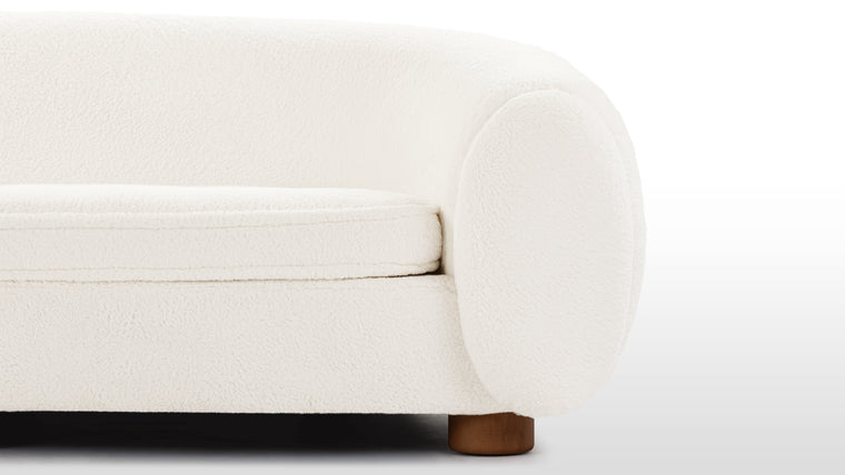 Sumptuous Sherpa | With its sumptuous cushions and soft upholstery, the Snow Sofa offers a truly luxurious seating experience. The generously padded seat and backrest provide optimal support, enveloping you in a cocoon of comfort. The thoughtfully chosen sherpa fabric adds an extra layer of tactile delight and visual appeal.
