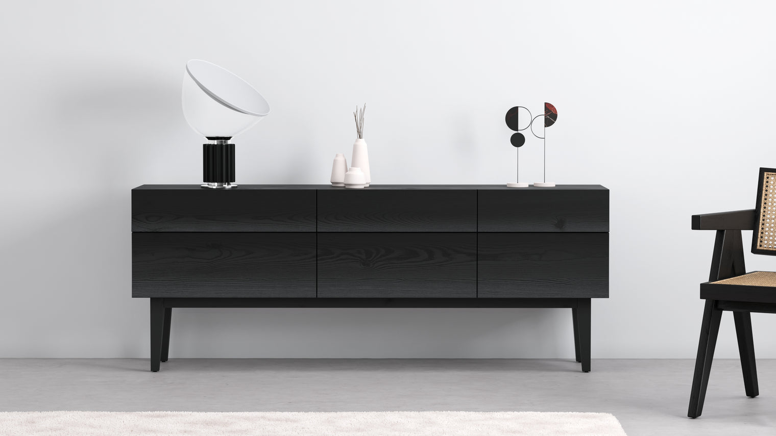 NORDIC CHIC | The Reflect Credenza is a stunning example of Scandinavian design that beautifully combines form and function. Crafted with an artistic curved front, this credenza is a timeless addition to contemporary living spaces, providing practical storage while serving as a stylish focal point.
