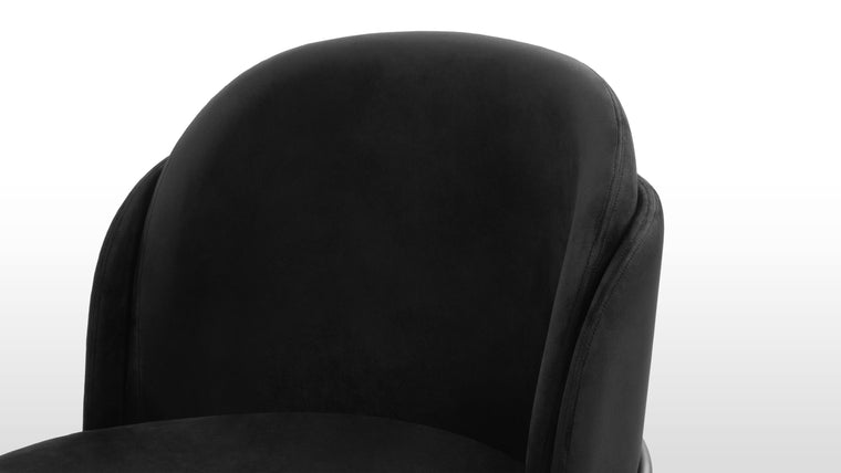 Stylish Comfort | The widely curved back encourages reclining, promising comfort through hours of sitting. With a smooth seat and a backrest that features an additional padded section, the Aben Dining Chair offers increased support.
