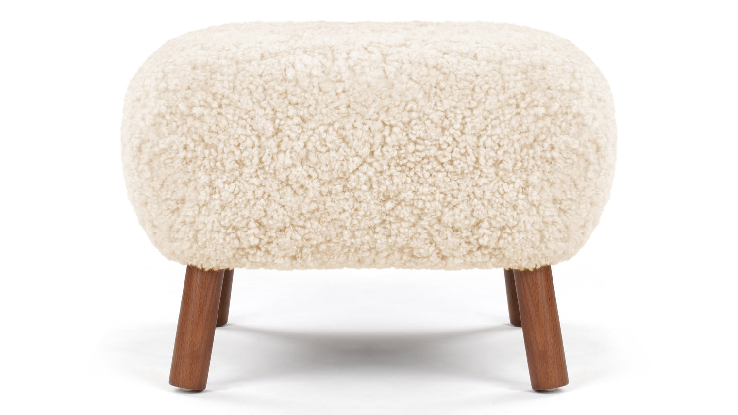 A PETITE COMPANION | Designed to complement the Petra Lounge Chair, the Petra Ottoman adds comfort and style to the cosy yet sophisticated chair. Not to be overshadowed by its predecessor, the stool is quite lovely and versatile on its own. It can be utilized as a traditional footstool or ottoman, and it’s also ideal for extra seating.
