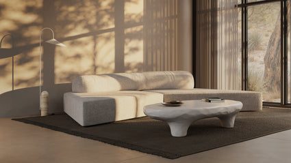 Modular Marvel|The On the Rocks Sofa stands out with its organic, fluid forms that mimic natural landscapes. Its design is inspired by the irregular shapes of rocks and boulders, creating a unique visual appeal that invites relaxation and social interaction.