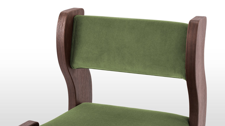 Chic Design | With fresh, bright-colored velvet, the Onda Side Chair is a highly fashionable accent. The undulating waves are unmistakably a la mode, the wood finished to perfection with rounded edges to soften the design.
