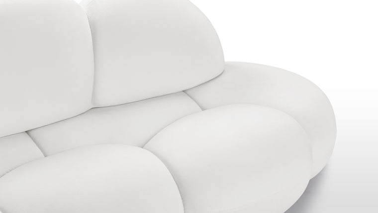 Quality Meets Avant-Garde Style | The sofa's cushioning is designed to provide optimal comfort, using advanced padding techniques that maintain their shape and support over time. This attention to detail in both materials and construction reflects a commitment to quality and excellence.
