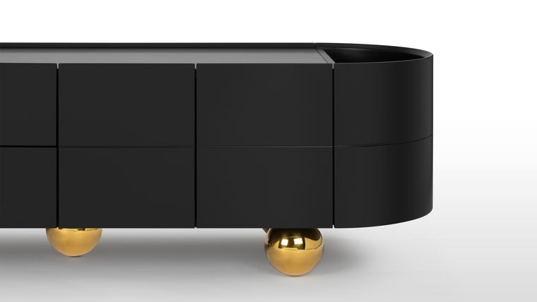 Contemporary Style | Available in either striking white or classic black, the console features brass ball feet that add a touch of luxury to its designer look. Rounded ends soften its silhouette, complementing its overall sleek and contemporary design.
