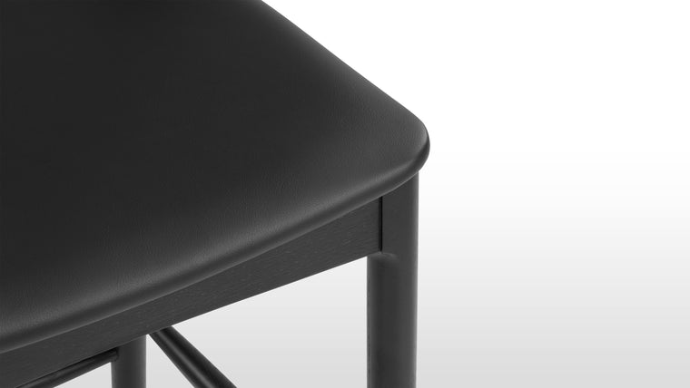 PERFECTLY PRACTICAL | Courtesy of its minimalist silhouette and smart design, the CH20 Elbow Counter Stool is lightweight small space friendly. Change up your dining and office space effortlessly with this chic seat.
