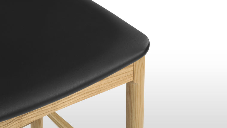 PERFECTLY PRACTICAL | Courtesy of its minimalist silhouette and smart design, the Elbow Counter Stool is lightweight small space friendly. Change up your dining and office space effortlessly with this chic seat.
