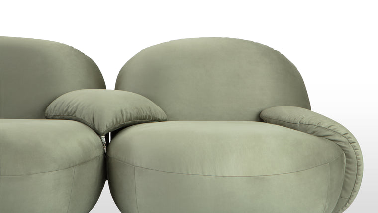 SOFT AND CURVACEOUS | Constructed with a sturdy frame and upholstered in premium materials, the Palais Sofa exudes quality craftsmanship and enduring beauty. Its graceful curves and opulent upholstery make it a stunning focal point in any room, while its ergonomic design ensures optimal support and comfort.
