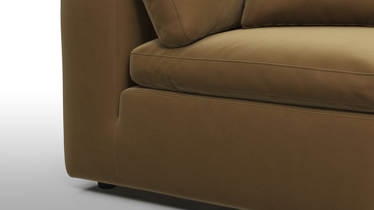 Supreme Comfort | Sink into unparalleled comfort with generously padded cushions. The sofa's deep seats and plush backrests provide the utmost relaxation, allowing for unwinding in absolute luxury after a long day.
