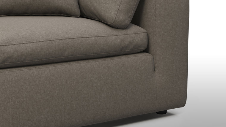 Supreme Comfort | Sink into unparalleled comfort with generously padded cushions. The sofa's deep seats and plush backrests provide the utmost relaxation, allowing for unwinding in absolute luxury after a long day.
