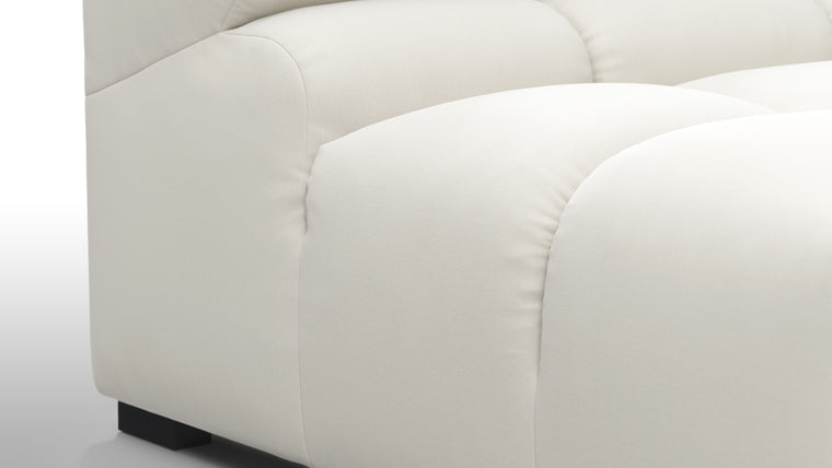 SUPERIOR COMFORT | Designed with the easy-going, informal ethos of the 1970s in mind, the Tufted modules are generously proportioned, coming together in a bench-like base with barely-there connections, allowing plenty of room for you to lean back and curl up in comfort.
