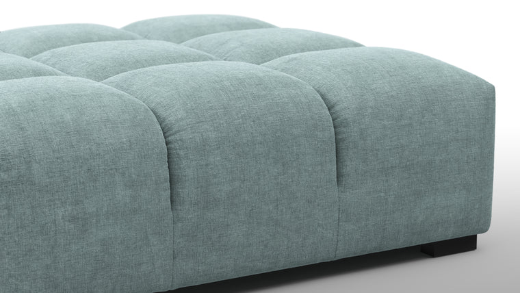 SUPERIOR COMFORT | Designed with the easy-going, informal ethos of the 1970s in mind, the Tufted modules are generously proportioned, coming together in a bench-like base with barely-there connections, allowing plenty of room for you to lean back and curl up in comfort.
