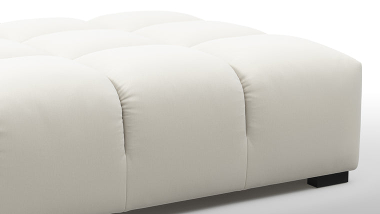 SUPERIOR COMFORT | Designed with the easy-going, informal ethos of the 1970s in mind, the Tufted modules are generously proportioned, coming together in a bench-like base with barely-there connections, allowing plenty of room for you to lean back and curl up in comfort.
