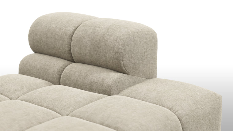 SUPERIOR COMFORT | Designed with the easy-going, informal ethos of the 1970s in mind, the Tufted modules are generously proportioned, coming together in a bench-like base with barely-there connections, allowing plenty of room for you to lean back and curl up in comfort.
