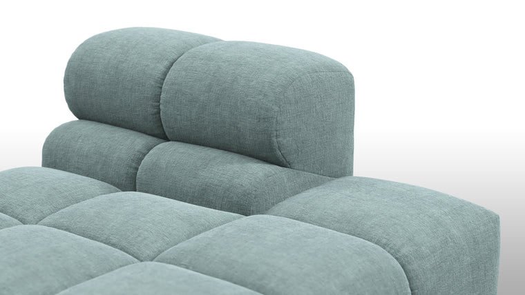 SUPERIOR COMFORT | Designed with the easy-going, informal ethos of the 1970s in mind, the Tufted modules are generously proportioned, coming together in a bench-like base with barely-there connections, allowing plenty of room for you to lean back and curl up in comfort.
