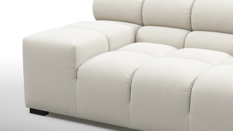 SUPERIOR COMFORT | Designed with the easy-going, informal ethos of the 1970s in mind, the Tufted modules are generously proportioned, coming together in a bench-like base with barely-there connections, allowing plenty of room for you to lean back and curl up in comfort.
