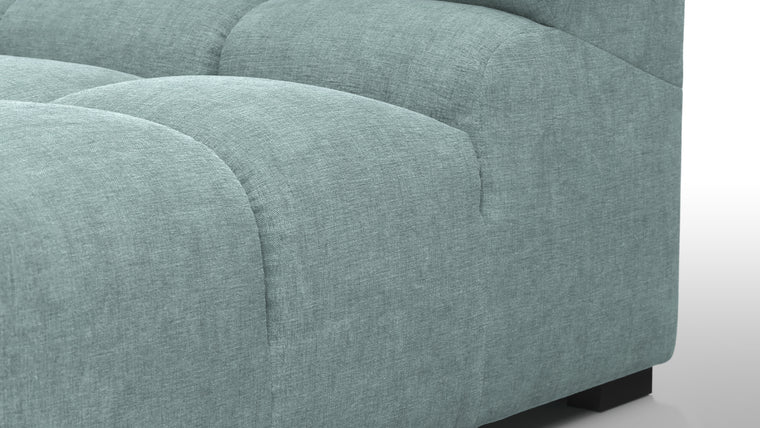 SUPERIOR COMFORT | Designed with the easy-going, informal ethos of the 1970s in mind, the Tufted modules are generously proportioned, coming together in a bench-like base with barely-there connections, allowing plenty of room for you to lean back and curl up in comfort.
