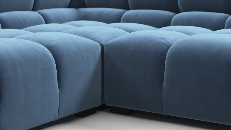 SUPERIOR COMFORT | Designed with the easy-going, informal ethos of the 1970s in mind, the Tufted modules are generously proportioned, coming together in a bench-like base with barely-there connections, allowing plenty of room for you to lean back and curl up in comfort.
