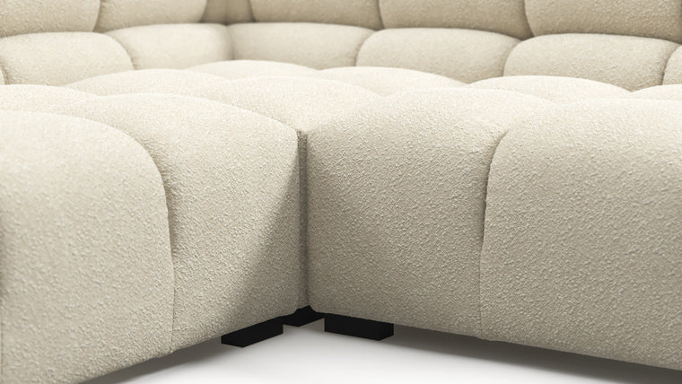 SUPERIOR COMFORT | Designed with the easy-going, informal ethos of the 1970s in mind, the Tufted modules are generously proportioned, coming together in a bench-like base with barely-there connections, allowing plenty of room for you to lean back and curl up in comfort.
