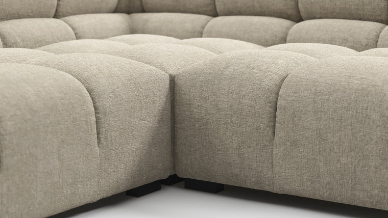 SUPERIOR COMFORT | Designed with the easy-going, informal ethos of the 1970s in mind, the Tufted modules are generously proportioned, coming together in a bench-like base with barely-there connections, allowing plenty of room for you to lean back and curl up in comfort.
