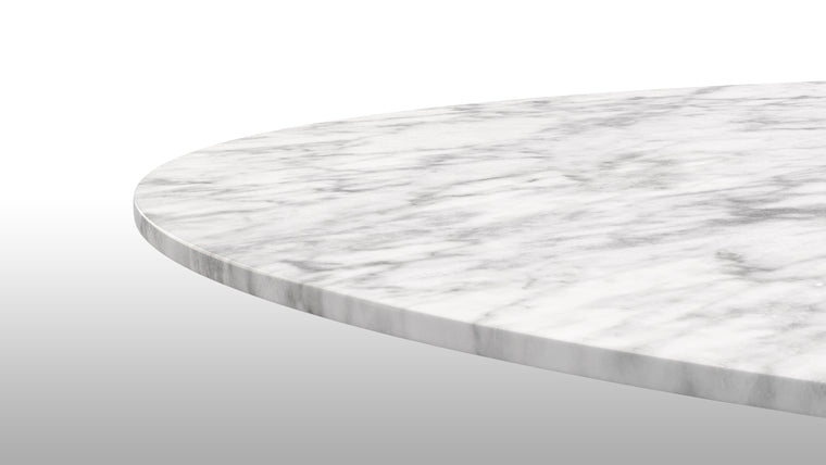 MARVELOUS MARBLE | This stylish iteration of the Aarhus Dining Table is handcrafted from only the finest materials, including a stunning white marble tabletop that’s just as beautiful as it is functional.
