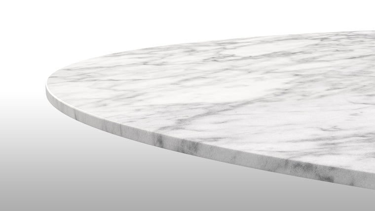 MARVELOUS MARBLE | This stylish iteration of the Aarhus Dining Table is handcrafted from only the finest materials, including a stunning white marble tabletop that’s just as beautiful as it is functional.
