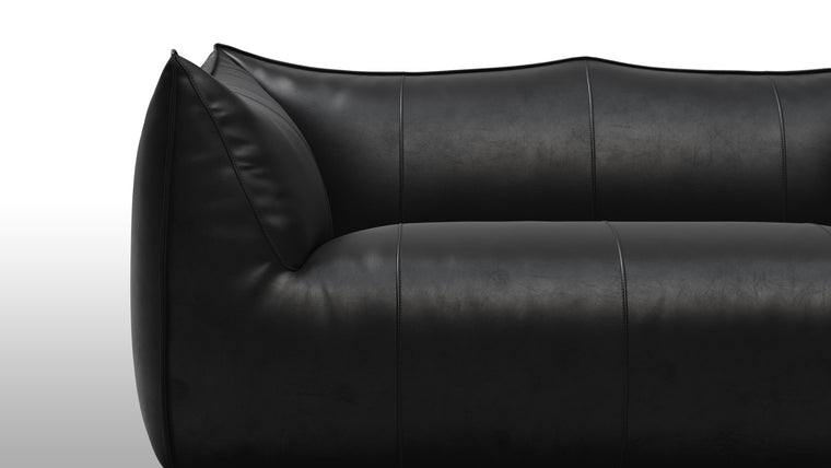 Cozy Comfort | Comfort is not compromised in the Leandro Sofa. Sink into its plush cushions and feel a sense of relaxation wash over you. The ergonomic design cradles your body, offering a cozy and supportive seating experience. Whether you're curling up with a book or enjoying a moment of solitude, this sofa envelops you in a world of comfort and tranquility.
