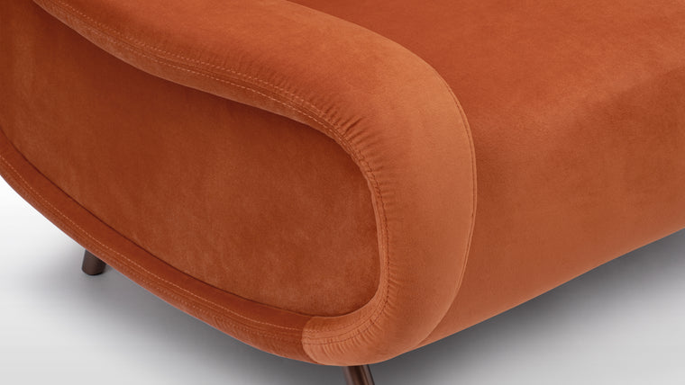 Curated Colors | The armchair is upholstered in a low-maintenance velvet fabric, providing a soft, elegant touch in a curated selection of sophisticated colors.
