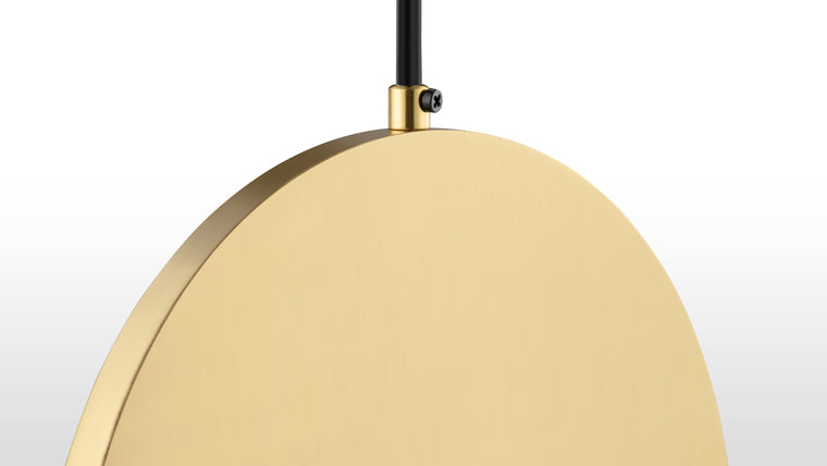 Shining Surfaces | Crafted from stainless steel with an option of chrome or gold finish, the pendant features an acrylic face that allows light to pass through while complementing its durable and luxurious materials.
