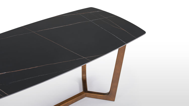 Contemporary Craftsmanship | With a black ceramic surface accented by gray veins and a sculptural walnut frame, this table embodies refined minimalism and natural beauty.
