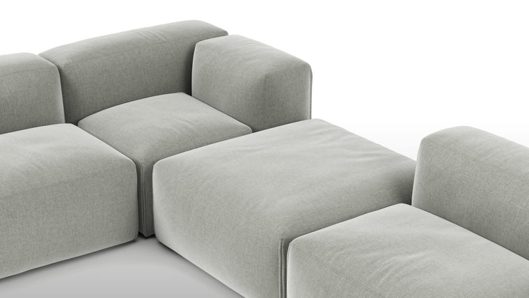 A Modern Invitation | The Le Mura Sectional exudes a modern yet inviting vibe with its soft, geometric shapes and neutral tones, seamlessly fitting into any design scheme. Its puffy design adds a touch of laid-back luxury to any room.
