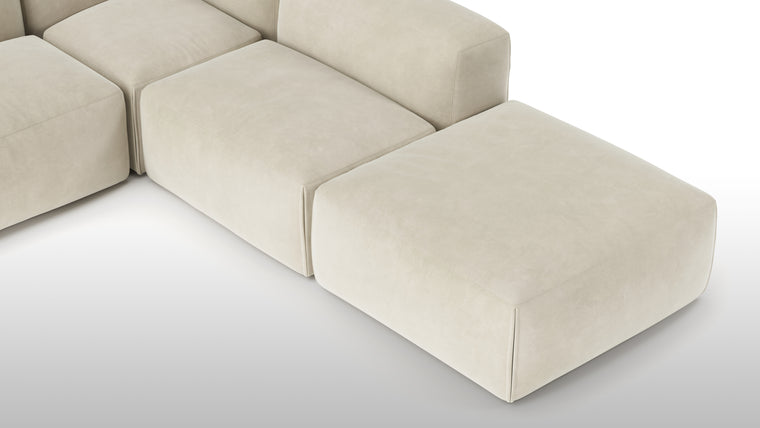 A Modern Invitation | The Le Mura Sectional exudes a modern yet inviting vibe with its soft, geometric shapes and neutral tones, seamlessly fitting into any design scheme. Its puffy design adds a touch of laid-back luxury to any room.
