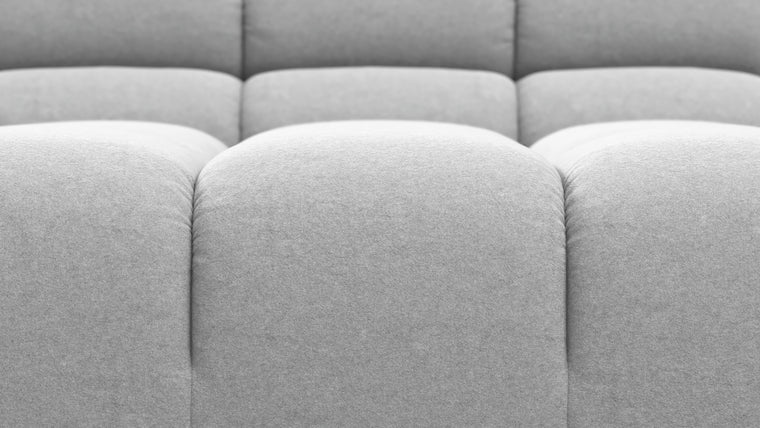 SUPERIOR COMFORT | Designed with the easy-going, informal ethos of the 1970s in mind, the Tufted modules are generously proportioned, coming together in a bench-like base with barely-there connections, allowing plenty of room for you to lean back and curl up in comfort.
