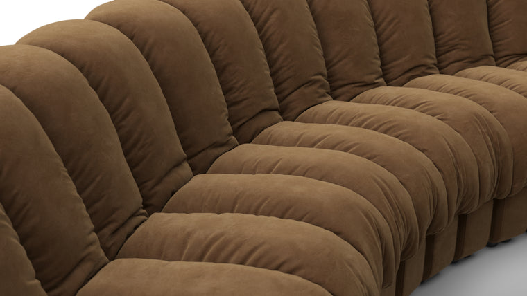 Sculptural Seating | Crafted with uncompromising attention to detail, the DS 600 Sofa showcases exceptional craftsmanship and luxurious materials. The plush upholstery, available in an array of fabrics from premium vegan leather to boucle, envelops you in unparalleled comfort. The elegant stitching and meticulous finishes reflect a dedication to quality and design integrity.
