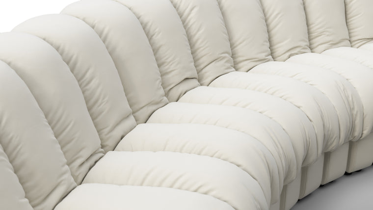 Sculptural Seating | Crafted with uncompromising attention to detail, the DS 600 Sofa showcases exceptional craftsmanship and luxurious materials. The plush upholstery, available in an array of fabrics from premium vegan leather to boucle, envelops you in unparalleled comfort. The elegant stitching and meticulous finishes reflect a dedication to quality and design integrity.
