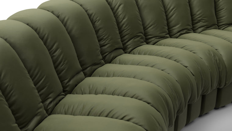 Sculptural Seating | Crafted with uncompromising attention to detail, the DS 600 Sofa showcases exceptional craftsmanship and luxurious materials. The plush upholstery, available in an array of fabrics from premium vegan leather to boucle, envelops you in unparalleled comfort. The elegant stitching and meticulous finishes reflect a dedication to quality and design integrity.
