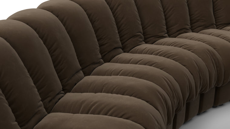 Sculptural Seating | Crafted with uncompromising attention to detail, the DS 600 Sofa showcases exceptional craftsmanship and luxurious materials. The plush upholstery, available in an array of fabrics from premium vegan leather to boucle, envelops you in unparalleled comfort. The elegant stitching and meticulous finishes reflect a dedication to quality and design integrity.
