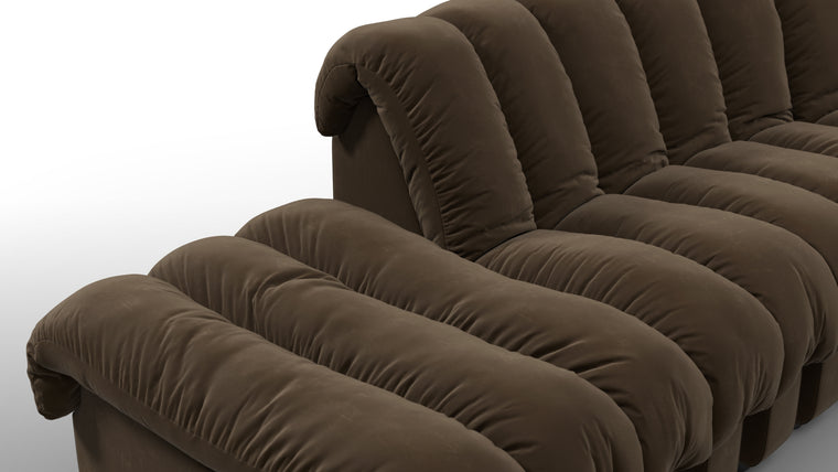 Sculptural Seating | Crafted with uncompromising attention to detail, the DS 600 Sofa showcases exceptional craftsmanship and luxurious materials. The plush upholstery, available in an array of fabrics from premium vegan leather to boucle, envelops you in unparalleled comfort. The elegant stitching and meticulous finishes reflect a dedication to quality and design integrity.
