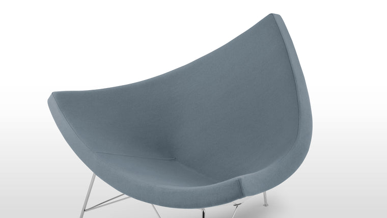 Prime Comfortability | The rounded, open form of this shell-like seat is designed for lounging with comfort in mind. Its wide shape allows plenty of room for you to tuck your feet up or cross your legs if that’s how you prefer to sit.
