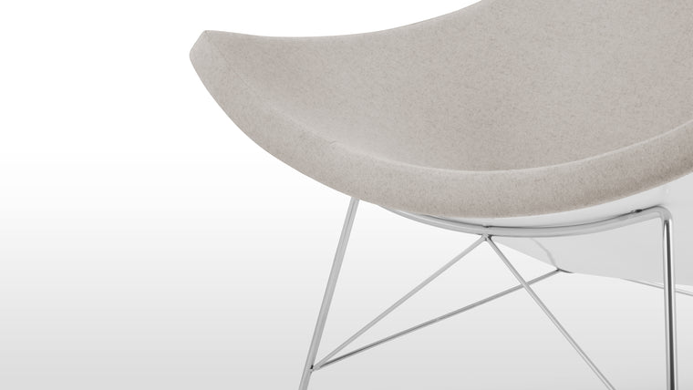 Prime Comfortability | The rounded, open form of this shell-like seat is designed for lounging with comfort in mind. Its wide shape allows plenty of room for you to tuck your feet up or cross your legs if that’s how you prefer to sit.
