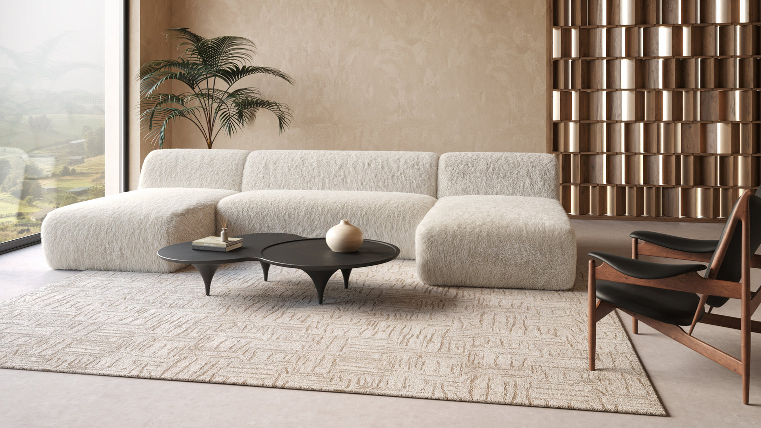 Luxe Comfort | The Iona Sectional Collection is the epitome of modern luxury and comfort, offering a sophisticated seating solution for contemporary homes. Upholstered in a plush, faux sheepskin fabric, it exudes warmth and indulgence while providing a cozy lounging experience.
