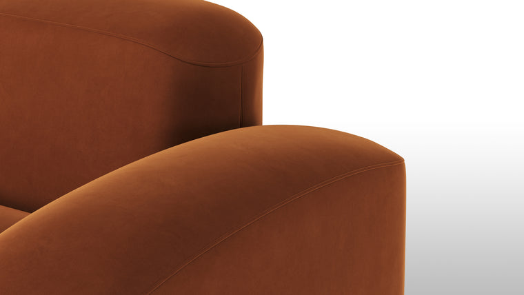 Warm Minimalism | Minimalist yet striking, the modules feature soft velvet upholstery, chunky arms, rounded edges, and detailed stitchwork for tactile and visual intrigue. The burnt orange hue adds a touch of warmth and timeless sophistication.
