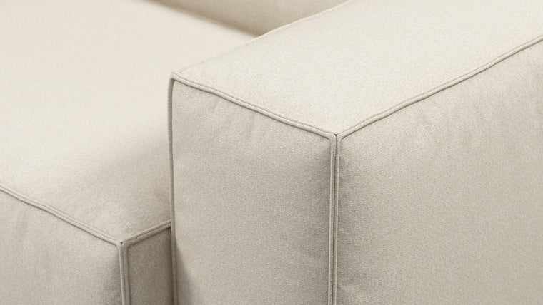 Durable Modernity | Featuring a boxy silhouette with deep seating, the collection is wrapped in neutral beige outdoor fabric and supported by a sleek, aluminum frame—blending modern design with durable materials.
