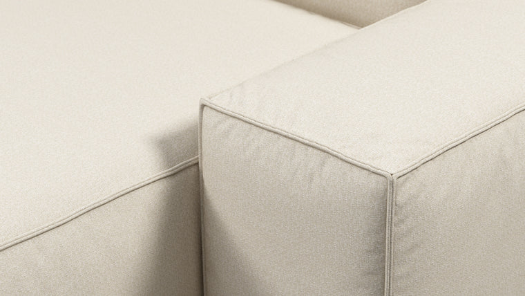 Durable Modernity | Featuring a boxy silhouette with deep seating, the collection is wrapped in neutral beige outdoor fabric and supported by a sleek, aluminum frame—blending modern design with durable materials.
