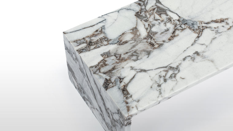 LUXE FINISH | The Ares coffee table’s simple form serves to highlight its high-end marble finish. The ample table top showcases the striking gray veining and natural depth that make marble such a beautiful, sought-after material.
