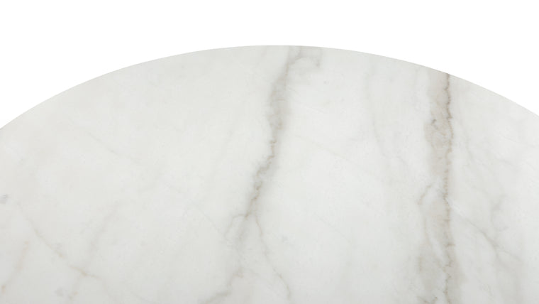 Marble Masterpiece | Made from honed natural marble, this beautiful modern table makes a stunning centrepiece. Its simple, striking form pays homage to this luxurious material, accentuating the distinctive texture and patina.
