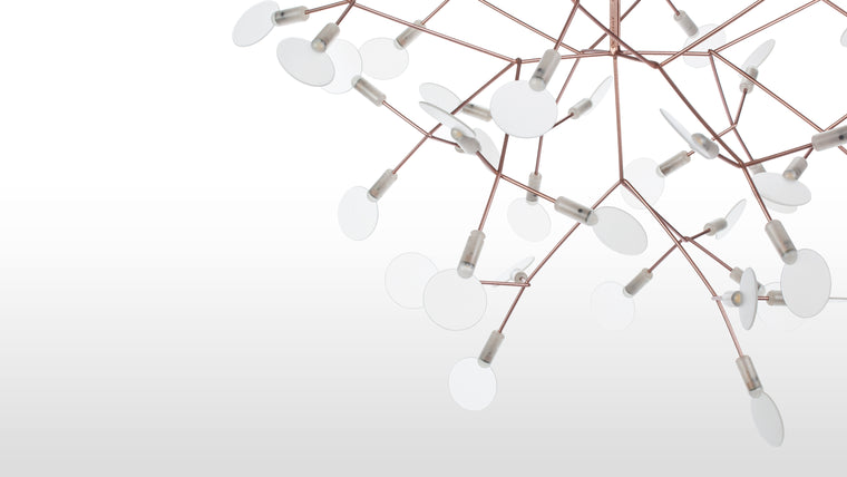 Nature’s Glow | More than just a chandelier, this piece serves as a luminous art installation, casting a warm, inviting radiance while enhancing the aesthetic of contemporary luxury interiors.
