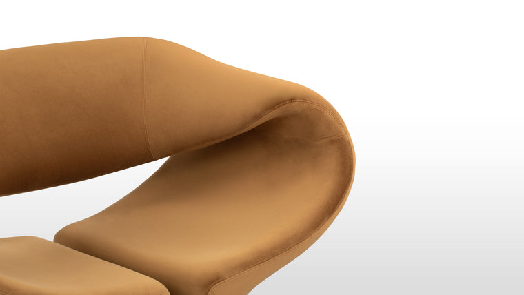 Ultimate Comfort | With its wide ergonomic seat, this chair is designed for luxurious lounging. The foam padding ensures plush support, making it ideal for extended relaxation in contemporary spaces.
