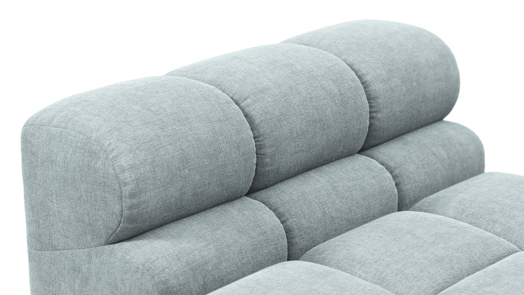 SUPERIOR COMFORT | Designed with the easy-going, informal ethos of the 1970s in mind, the Tufty modules are generously proportioned, coming together in a bench-like base with barely-there connections, allowing plenty of room for you to lean back and curl up in comfort.
